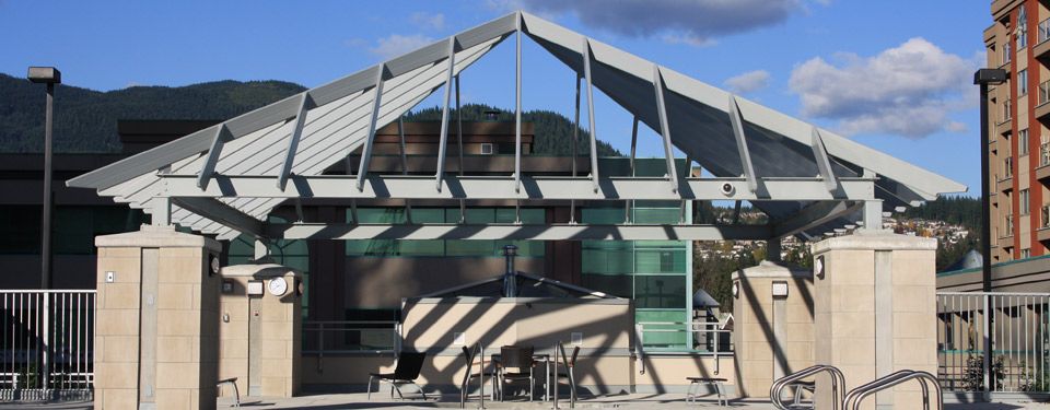 Steel pyramid poolside structure