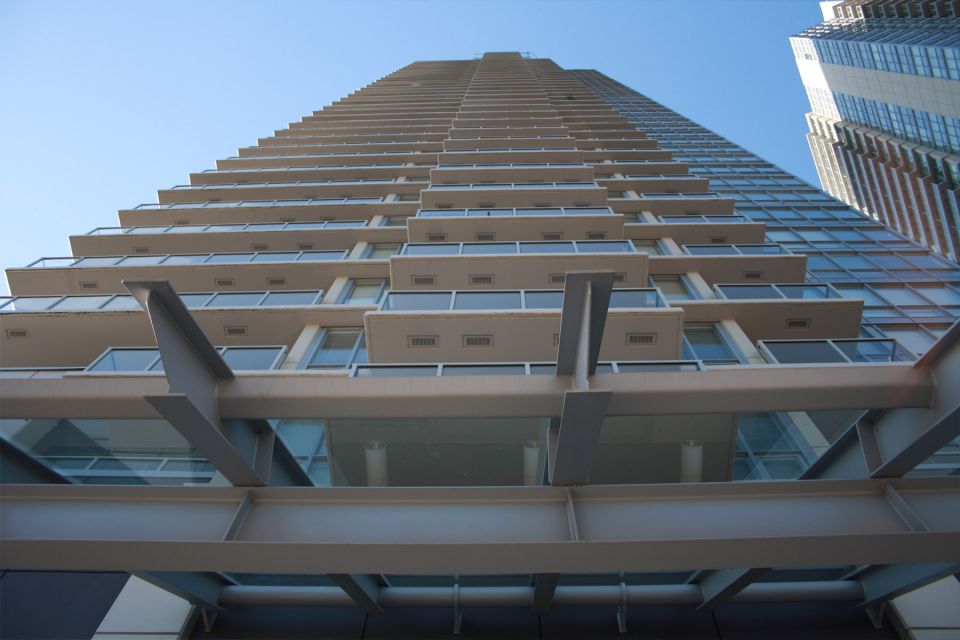 Upward view of building with overhang